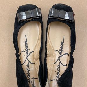 Square toe flat with bow.